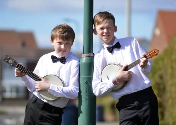 James Bassett, right, and Tai Steehouder performed at the Queen's birthday celebrations.