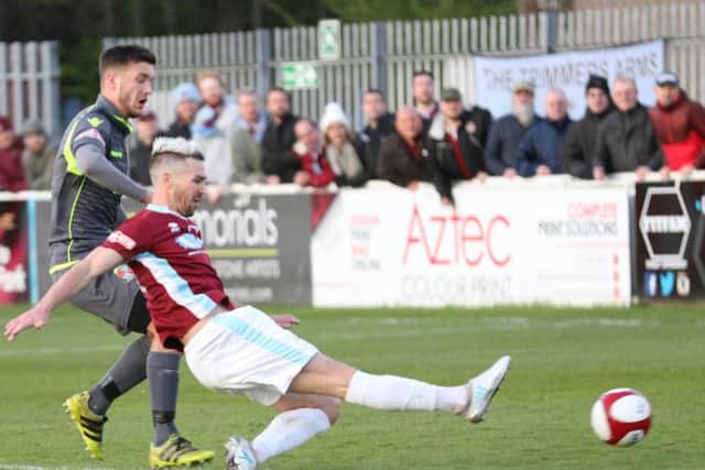 Carl Finnigan scores South Shields' third goal against Kendal. Picture by Peter Talbot