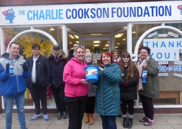 Joanna Nicholson, fundraising and events manager at the Charlie Cookson Foundation, and Rachael Pippin, lecturer in autism at South Tyneside College, with students who completed the fundraising walk.