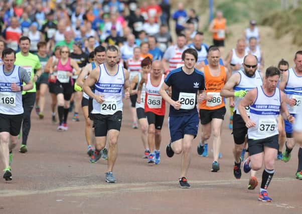 Hundreds of athletes set off from the start in the Sand Dancer 10km race over the Leas. Picture by Tim Richardson.