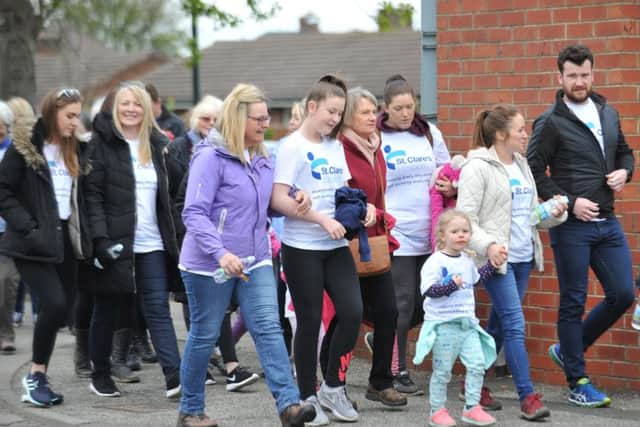 Walkers set off from St Clare's Hospice on their Memory Walk.