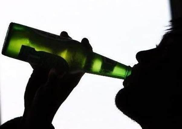 Campaigners want England to follow Scotland's lead with a minimum unit price on alcohol. Photo: PA.