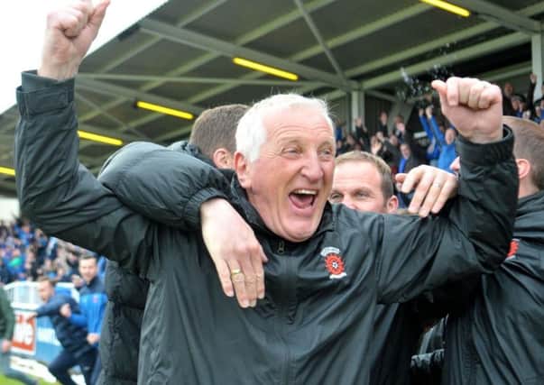 Ronnie Moore celebrates keeping Hartlepool United in the Football League in 2014-15. Picture by Frank Reid