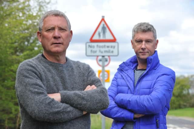 Mick Smith, left, and Graham Ivison are campaigning for a pavement along Moor Lane, Cleadon.