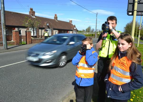 Hedworth Lane Primary School youngsters catch speeding drivers with the help of PC Luiz Scheidt.