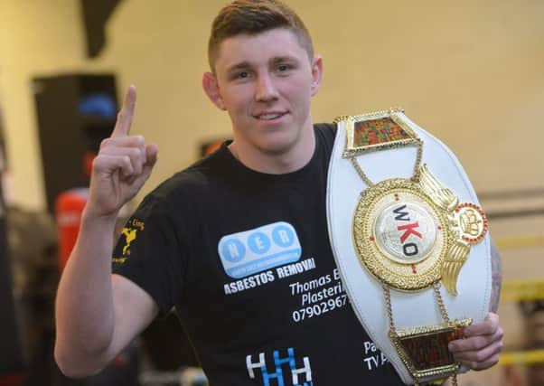 Nathan McCarthy has won a world title belt in Kickboxing