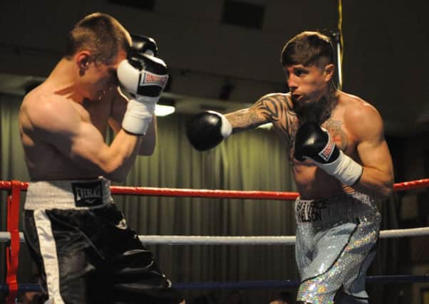 Anthony Nelson (right) in action against Sima Volosinas at Temple Park Leisure Centre recently.