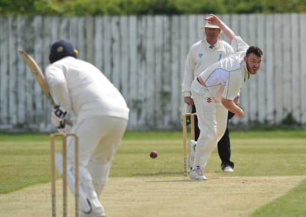 Boldon bowler Nick Sampson takes aim against Washington, played at Boldon Cricket Club.
