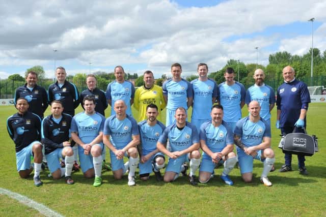 Footballers from Manchester Emergency Services take on a team from the Hilton, Gateshead, at Mariners Park to raise money for Chloe and Liam Together Forever Trust.