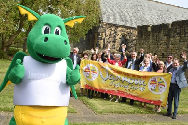 The Deputy Mayor and Deputy Mayoress of South Tyneside join organisers to help the Jarrow Festival Dragon launch the festival.