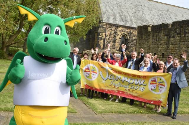 The Deputy Mayor and Deputy Mayoress of South Tyneside join organisers to help the Jarrow Festival Dragon launch the festival.
