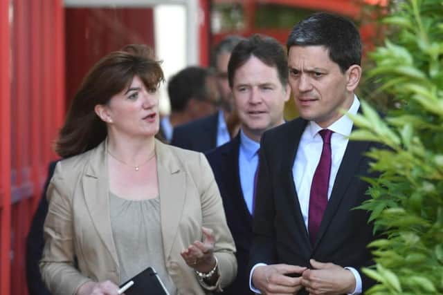 From left, Nicky Morgan, Sir Nick Clegg and David Miliband at the cross-party intervention Brexit negotiation at Tilda Rice Mill in Rainham, Essex. Pic: Stefan Rousseau/PA Wire.