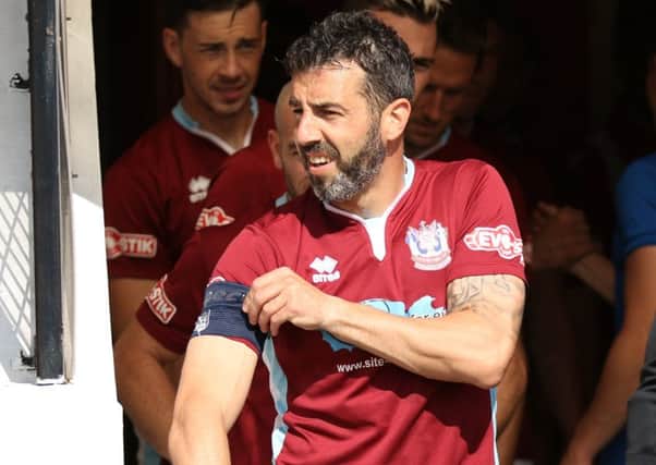 Julio Arca leads out South Shields