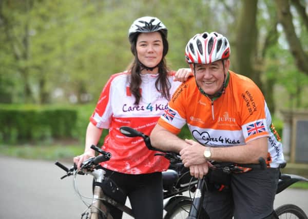 Father and daughter David and Samantha Sinclair are off to Vietnam for a 400km charity bike ride.