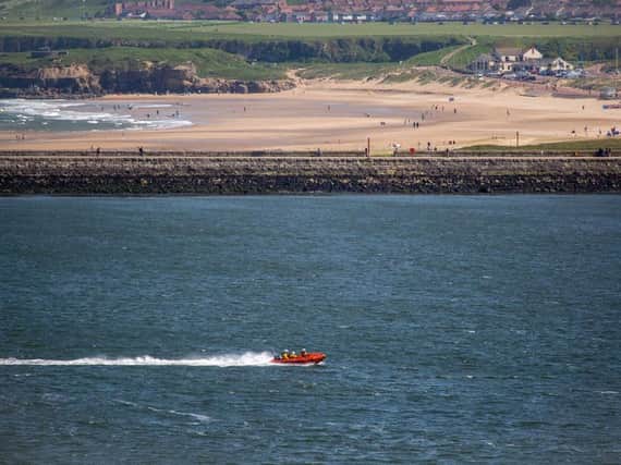 Three teenagers were rescued after being swept out to sea. Picture by RNLI/Adrian Don.