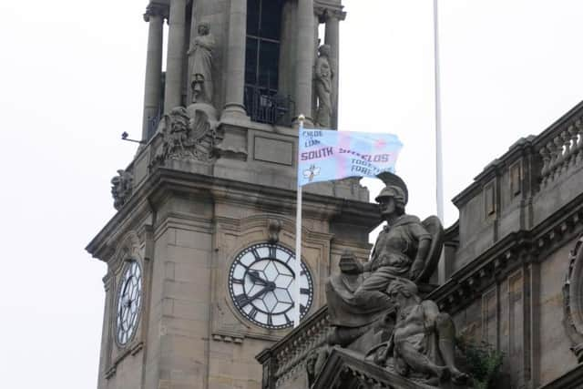 A pink and blue flag pays tribute at the Town Hall to South Shields couple Chloe Rutherford and Liam Curry.