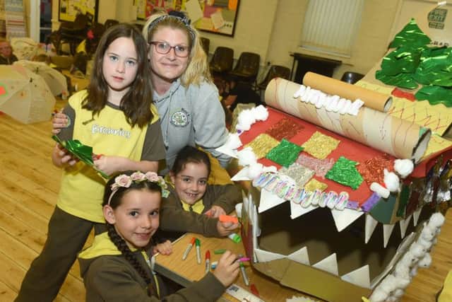 Danielle Pollard from Williby Rocs Eco Crafts with Brownies (left to right) Molly Swinney from St Matthews, Amelia Franchi from St Matthews and Lydia Bowman-Fuller from Valley View. Pic by Doug Moody Photography.