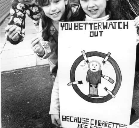 Hedworthfield Junior School pupils were busy spreading an anti-smoking message in March 1990. Pictured, from left, are rappers Stefanie Grimes and Jemma Graham, with Suzanne Ferriday and her anti-nicotine poster.