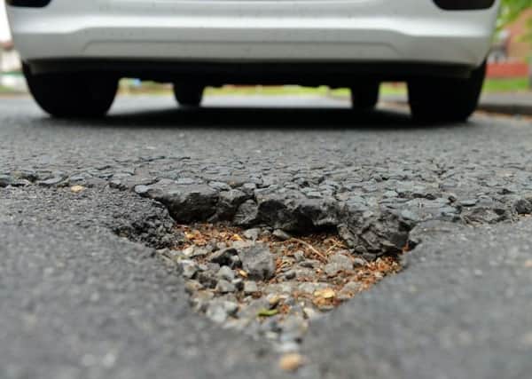 Council bosses have admitted ro road repair backlog