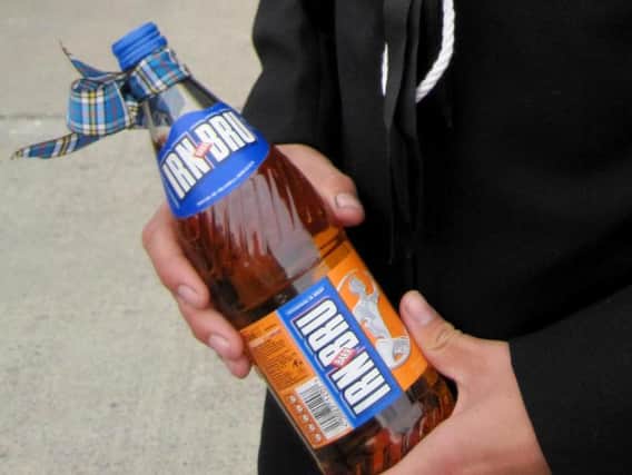 Pop lovers have been warned that the tops of glass bottles of Irn Bru, and other drinks, might fly off unexpectedly.