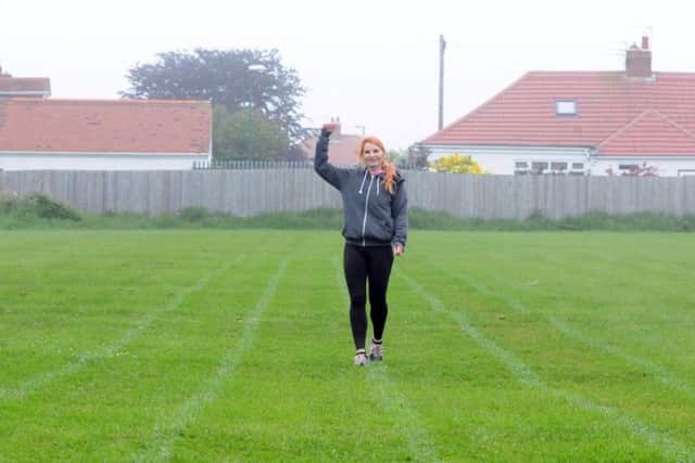 Katie Clouston runs backwards in aid of Mind charity