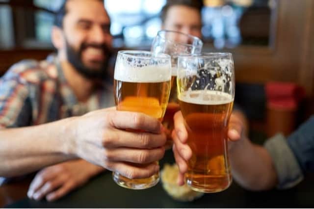 Going on holiday is a time to relax and unwind, and many travellers opt to have a cheeky pint or two at the airport before jetting off (Photo: Shutterstock)