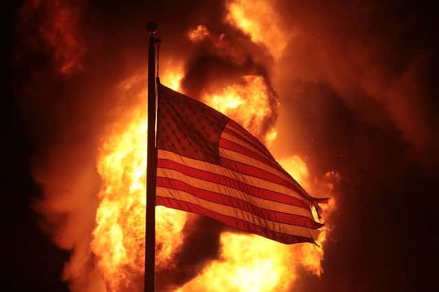 Protests have been t aking place in Kenosha, Wisconsin since Sunday night (Getty Images)