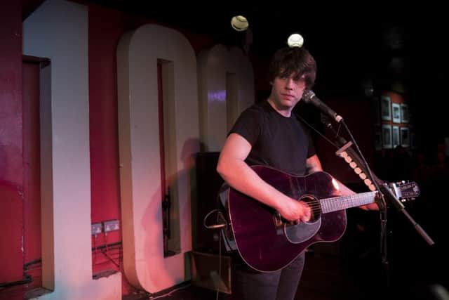 Jake Bugg performs live on stage at The 100 Club (photo: John Phillips/Getty Images)