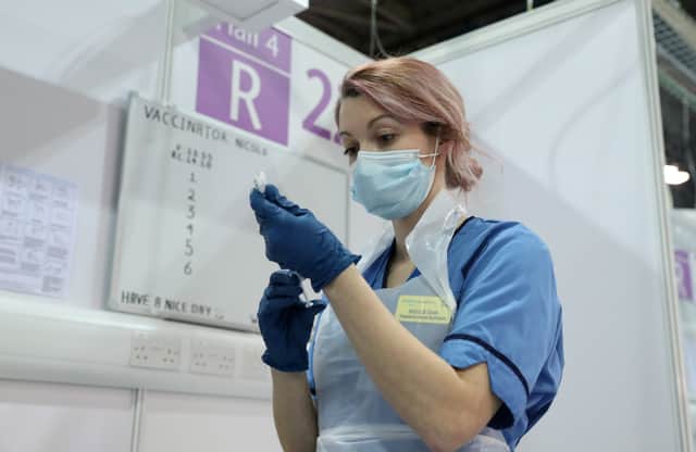 Key workers will get first priority for Covid vaccine after over-50s - including teachers and police (Photo by Andrew Milligan - WPA Pool/Getty Images)